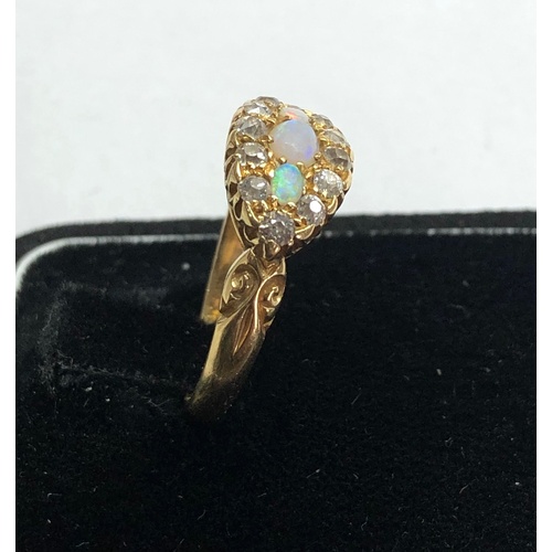 167 - Antique 18ct gold diamond and opal ring