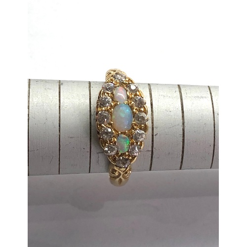 167 - Antique 18ct gold diamond and opal ring