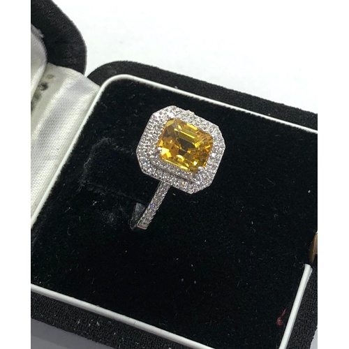 168 - Fine 2.46ct yellow sapphire and diamond ring central yellow sapphire measures approx 8mm by 7mm with... 