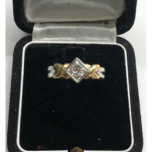 172 - Platinuim and gold diamond ring central diamond mesures approx 5.5mm sq