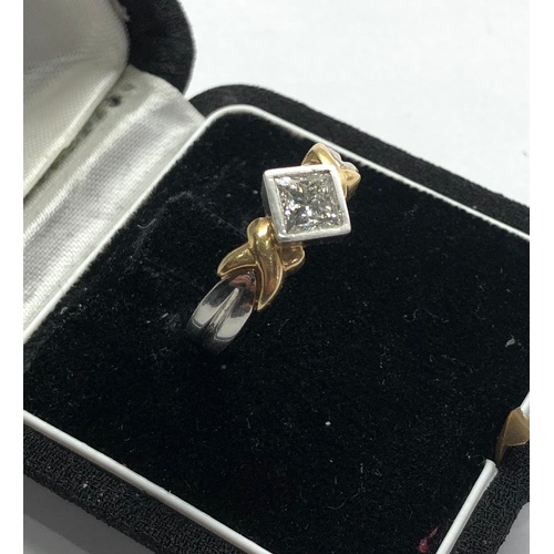 172 - Platinuim and gold diamond ring central diamond mesures approx 5.5mm sq