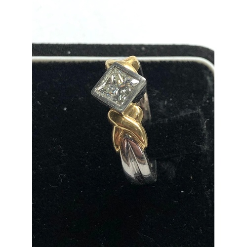 172 - Platinuim and gold diamond ring central diamond mesures approx 5.5mm sq