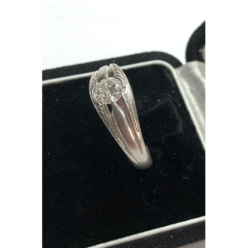 176 - Platinum diamond ring central diamond measures approx 6mm dia