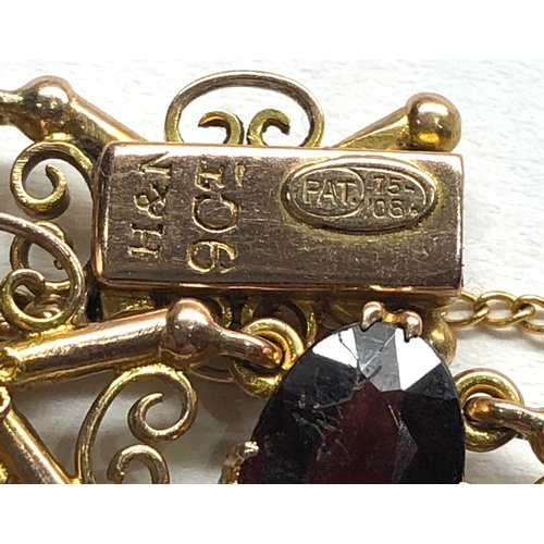 183 - Vintage 9ct gold and garnet bracelet measures approx 19cm by 1.2cm wide fully hallmarked weight 14.6... 