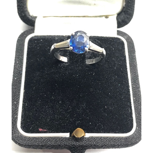 185 - Platinum sapphire ring central sapphire measures approx 9mm by 6.5mm