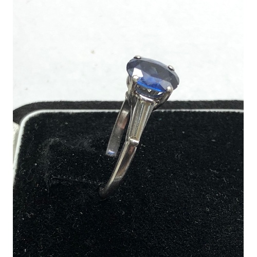 185 - Platinum sapphire ring central sapphire measures approx 9mm by 6.5mm