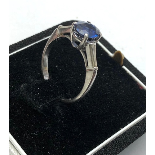 185 - Platinum sapphire ring central sapphire measures approx 9mm by 6.5mm