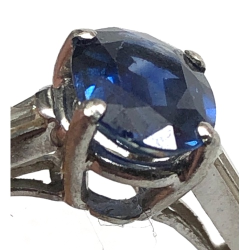 185 - Platinum sapphire ring central sapphire measures approx 9mm by 6.5mm