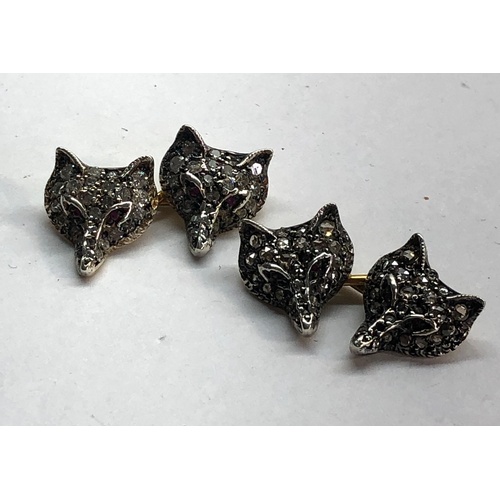 194 - Silver and gold back rose diamond fox head cufflinks set with ruby eyes