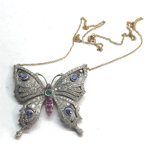 195 - Large diamond emerald ruby and sapphire stone set butterfly pendant measures approx 45mm by 46mm and... 