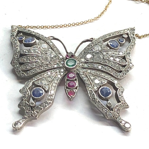 195 - Large diamond emerald ruby and sapphire stone set butterfly pendant measures approx 45mm by 46mm and... 