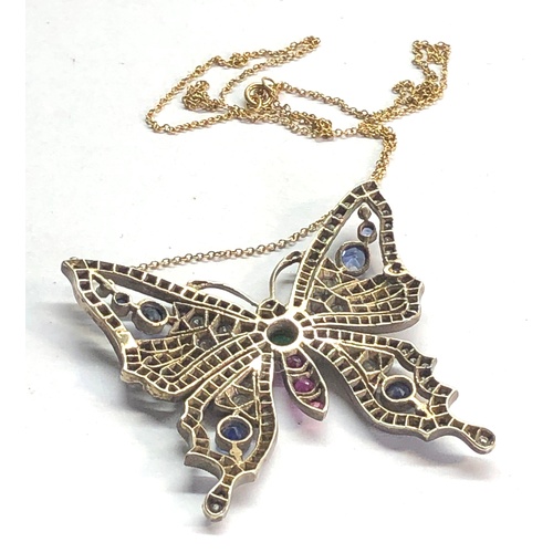 195 - Large diamond emerald ruby and sapphire stone set butterfly pendant measures approx 45mm by 46mm and... 