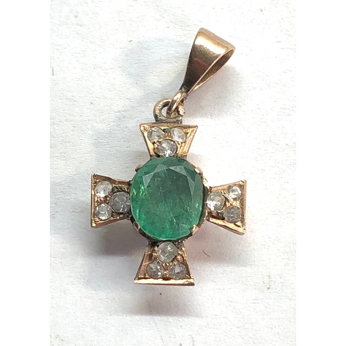 203 - Small gold diamond and emerald pendant central emerald measures approx 8mm by 7mm