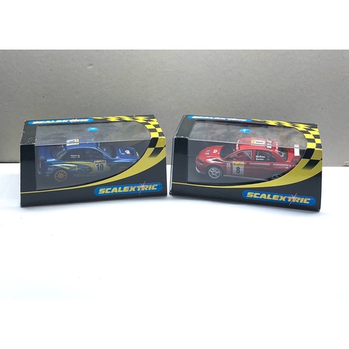 397 - 2 Boxed scalextric car c2362 Mitsubishi Lancer and Subaru Impreza c2412