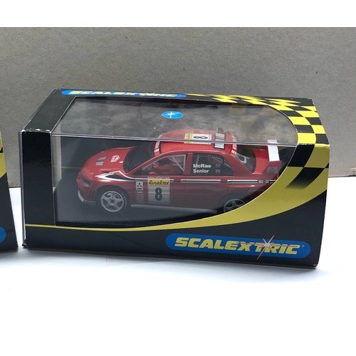 397 - 2 Boxed scalextric car c2362 Mitsubishi Lancer and Subaru Impreza c2412