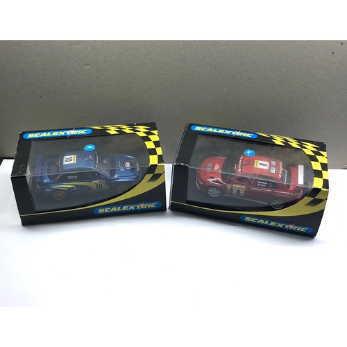 397 - 2 Boxed scalextric car c2362 Mitsubishi Lancer and Subaru Impreza c2412