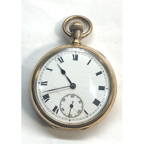 229 - Gold plated open face pocket watch the watch winds and ticks but no warranty given case measures app... 