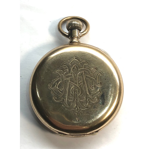 229 - Gold plated open face pocket watch the watch winds and ticks but no warranty given case measures app... 