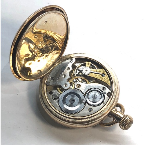 229 - Gold plated open face pocket watch the watch winds and ticks but no warranty given case measures app... 