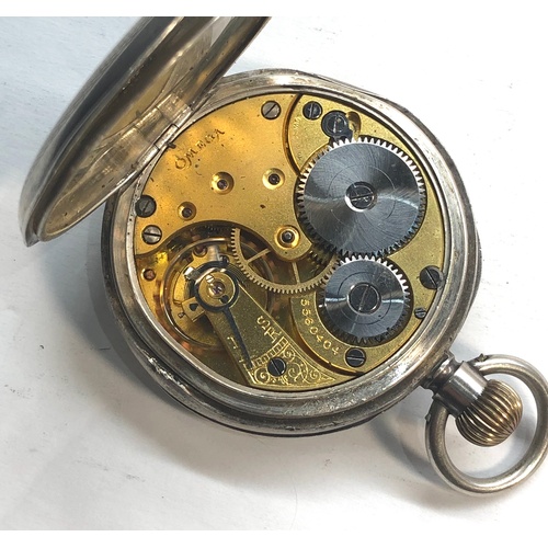 232 - Silver Omega pocket watch watch is ticking good condition measures approx 51mm dia