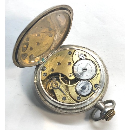 233 - Silver omega pocket watch the watch winds and ticks the case measures approx 49mm dia