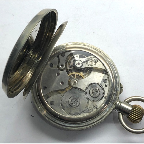 253 - Goliath pocket watch nickel cased watch winds and ticks watch measures approx 66mm dia not including... 