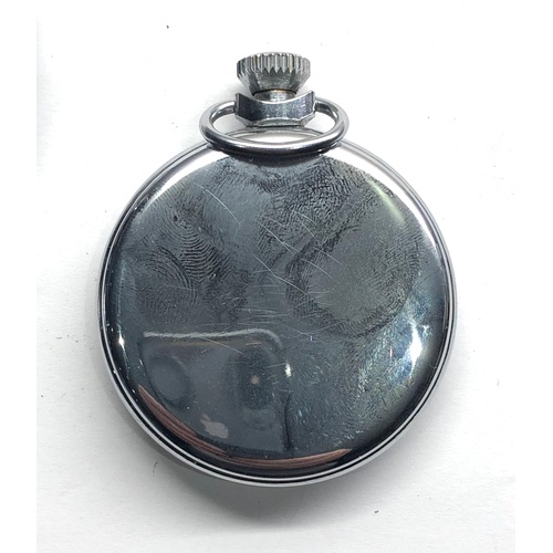 257 - Vintage Ingersoll automated football pocket watch complete with original outer case watch winds and ... 