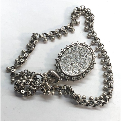 83A - Victorian silver locket and collar