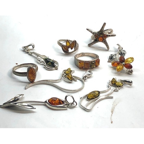 90 - Selection of silver and amber jewellery rings pendant etc