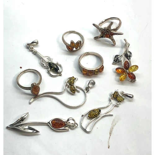 90 - Selection of silver and amber jewellery rings pendant etc