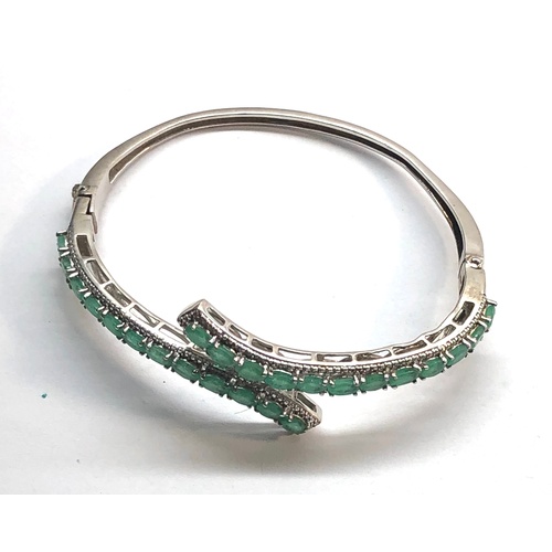 98 - Silver and emerald stone set bracelet