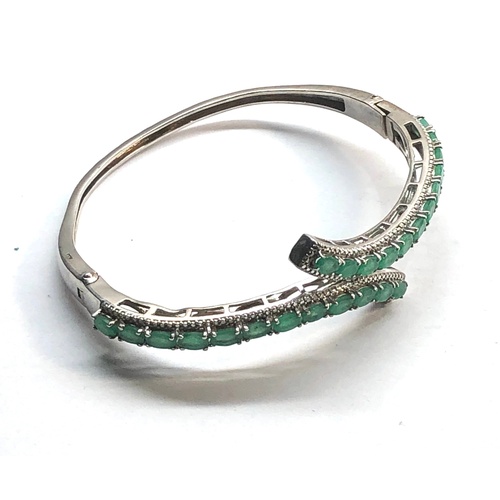 98 - Silver and emerald stone set bracelet