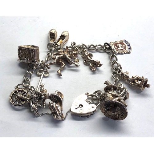 103 - Vintage silver charm bracelet