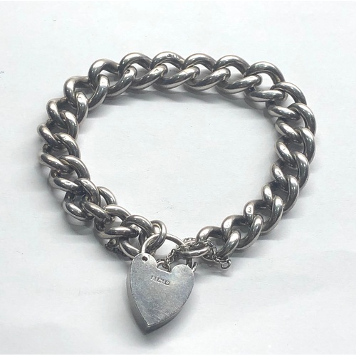 104 - Vintage chunky silver charm bracelet weight 48g, the heart is hallmarked 1963, chain hallmarked with... 