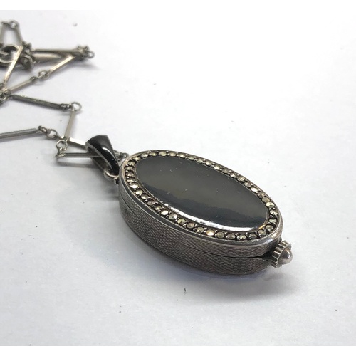 290 - Vintage silver and enamel pendant watch black enamel with marcasite border named Bucherer with chain