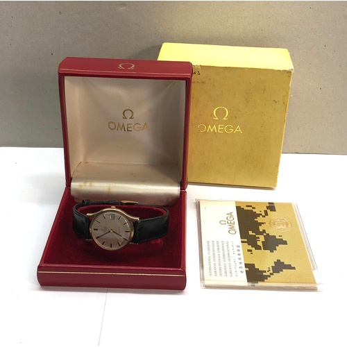 307 - Vintage 9ct gold presentation Omega automatic Geneve gents wristwatch boxes and booklett omega leath... 