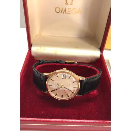 307 - Vintage 9ct gold presentation Omega automatic Geneve gents wristwatch boxes and booklett omega leath... 