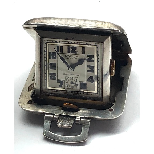 310 - Vintage Statum Geneve silver purse watch watch winds and ticks silver hallmarked case