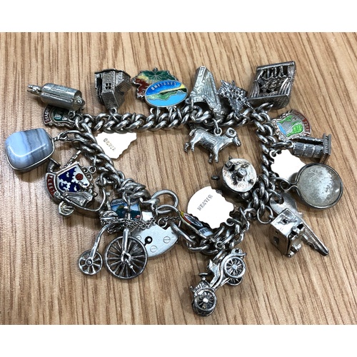 102 - Vintage silver charm bracelet