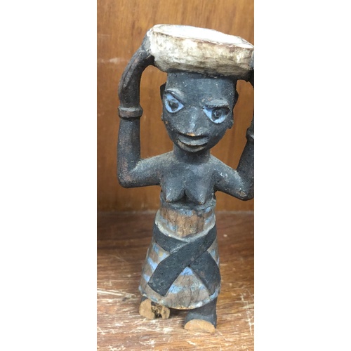 43 - Shelf of african carved figures