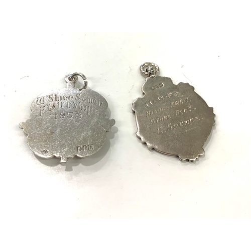 101 - 2 Watch chain fobs, both silver hallmarks.