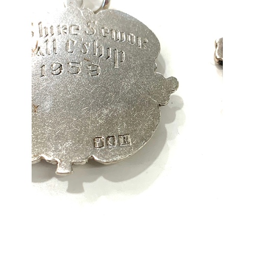 101 - 2 Watch chain fobs, both silver hallmarks.