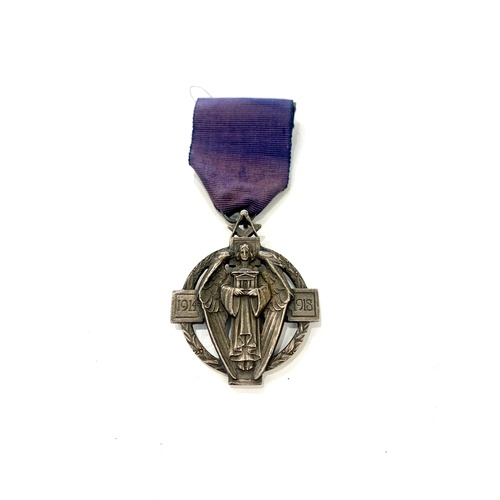 381 - Silver Masonic Hall Stone Million Memorial Jewel  depicting a standing angel against a cross and wre... 