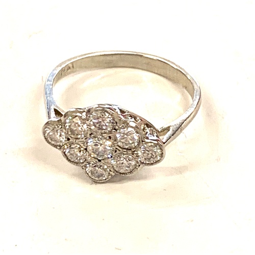 167 - Platinum and diamond ladies cluster ring, ring size M/N, approximate weight 3.4g, Inside of ring rea... 