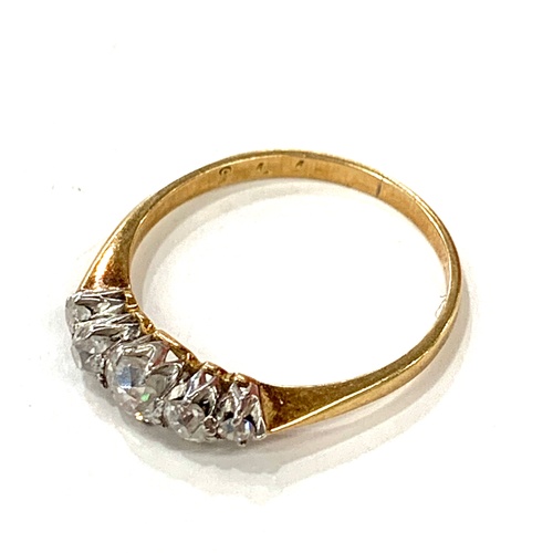 176 - Gold and diamond ring (not hallmarked, but tested as gold),  5 stone design, ring size L, approximat... 