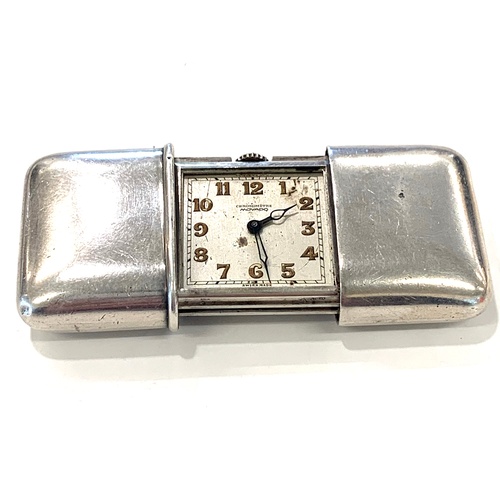 9 - silver Movado purse watch, missing glass, in need of restoration, untested no warranty given