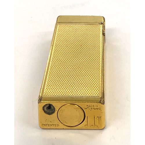 388 - Vintage Dunhill cigarette lighter, in good untested condition as shown in images. Edge ware to light... 