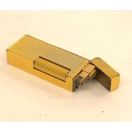 388 - Vintage Dunhill cigarette lighter, in good untested condition as shown in images. Edge ware to light... 