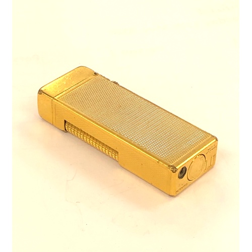 388 - Vintage Dunhill cigarette lighter, in good untested condition as shown in images. Edge ware to light... 