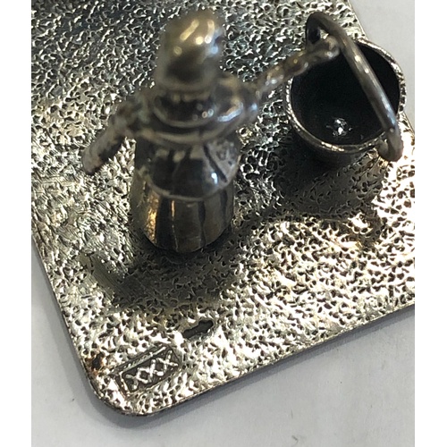 107 - Dutch silver miniature, silver hallmarks, girl by a wishing well, measures 5.2cm by 2.5